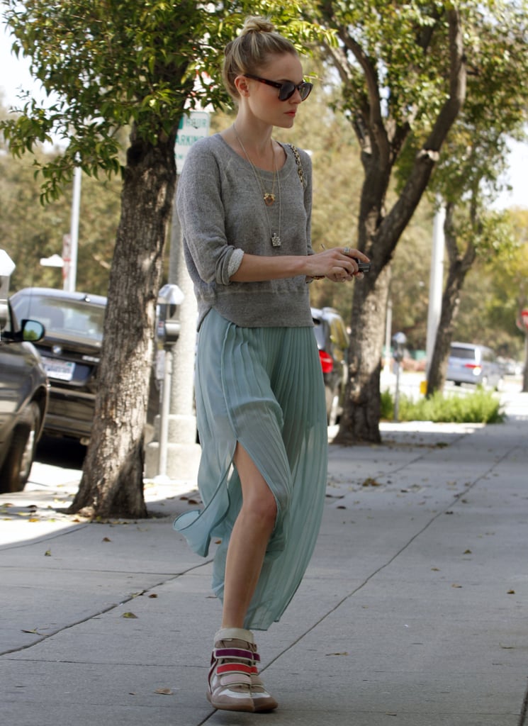 Kate showed us a brand-new way to wear our favorite wedge sneakers  in April 2012, pairing them with a gray pullover and a frothy mint-colored maxi skirt.