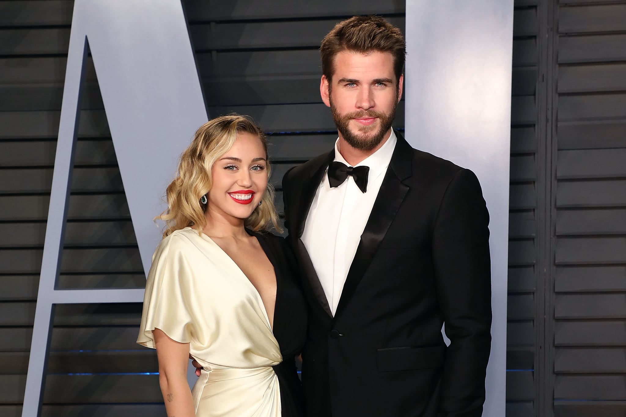 BEVERLY HILLS, CA - MARCH 04:  Miley Cyrus and Liam Hemsworth attend the 2018 Vanity Fair Oscar Party hosted by Radhika Jones at the Wallis Annenberg Centre for the Performing Arts on March 4, 2018 in Beverly Hills, California.  (Photo by Taylor Hill/FilmMagic)