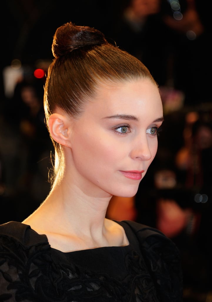 You'll need a good amount of gel or pomade to get your hair to stay put à la Rooney Mara. She has no flyaways in sight.