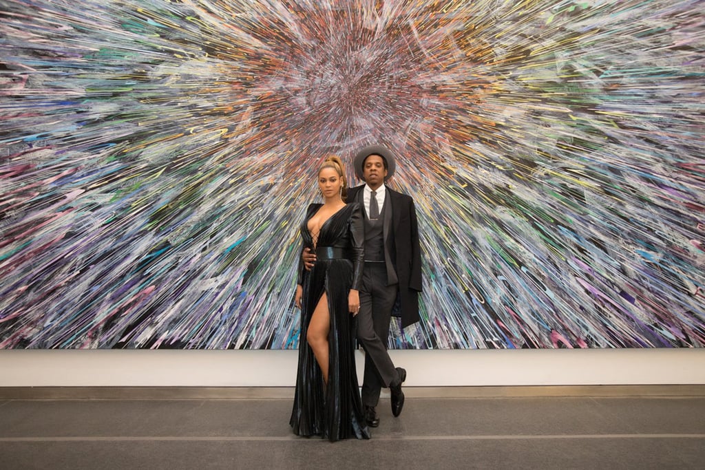 Beyoncé and JAY-Z were dressed to the nines for the annual Roc Nation in NYC on Saturday. The singer shared a couple of snaps of them posing in front of a mural and descending a staircase in style; Beyoncé showed off her curves in a low-cut, high-slit black dress, while JAY went for a vest and hat. Inside the event — which is thrown by JAY's entertainment company — JAY mingled with rappers like Diddy, T.I., Fat Joe, and Big Sean, while Beyoncé met up with Mariah Carey. Also in attendance were Nick Jonas, Monica, Cassie, and model Winnie Harlow.
Later in the evening, Beyoncé and JAY did a costume change for Clive Davis's annual pre-Grammys party, during which JAY was honored with the Grammys salute for his decades-long music career. While on stage, Clive even referred to Beyoncé as "the first lady of music," and the crowd gave her a standing ovation.
The couple is also heading to the Grammys on Sunday night — 4:44, JAY's auditory response to his wife's Lemonade, is nominated for eight awards. Keep reading to see Bey and JAY's glamorous day out, then check out the best photos from their many years together.

    Related:

            
            
                                    
                            

            JAY-Z&apos;s Clever Clapback to Trump&apos;s "Sh*thole" Comment Deserves an Award