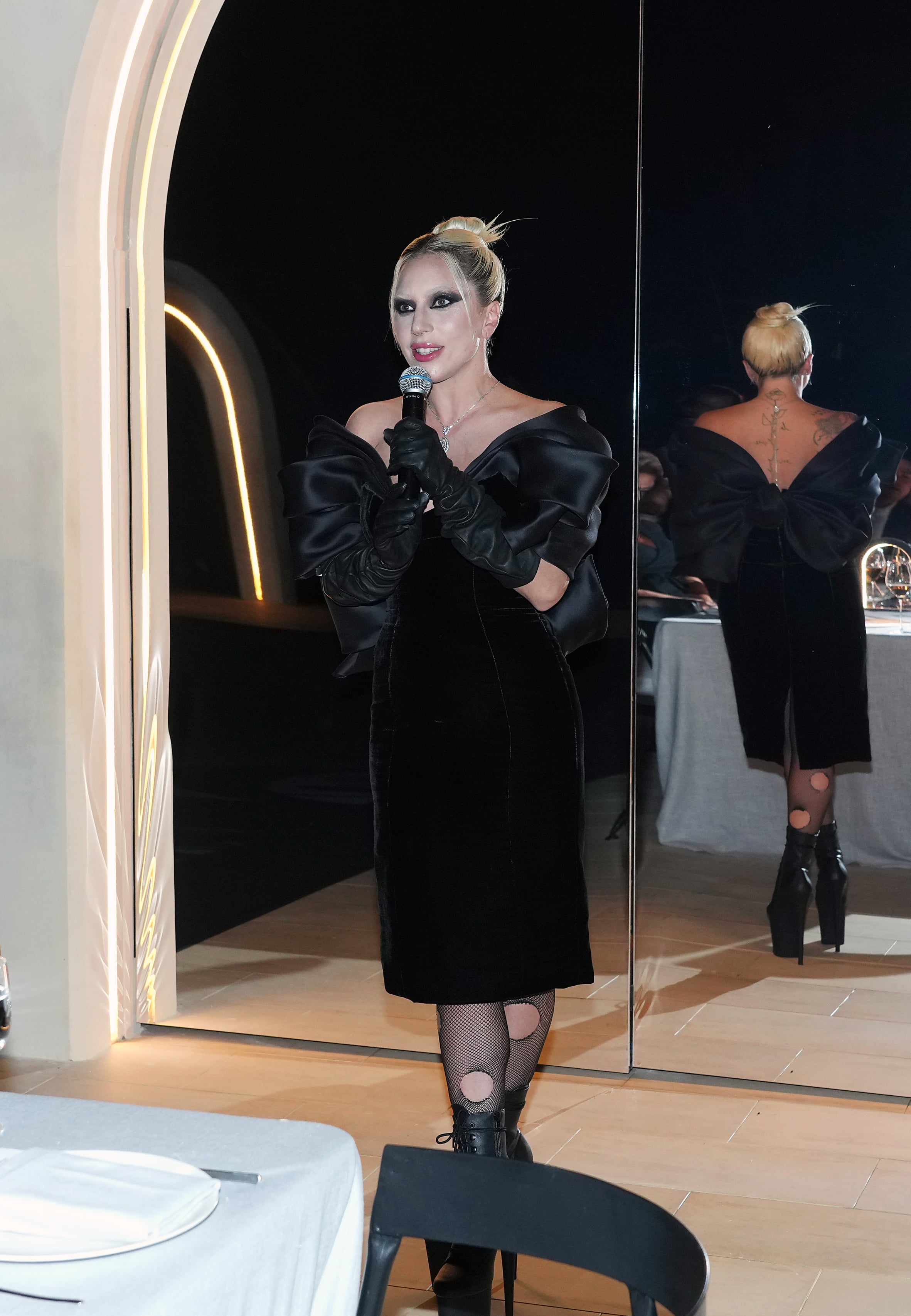 Lady Gaga Stuns In Ripped Fishnet To Dom Perignon Event: Photos