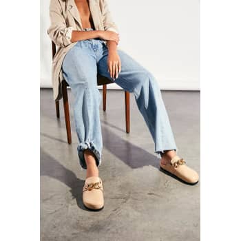 Finally, Comfortable and Chic Mules With a Backstrap for Comfort