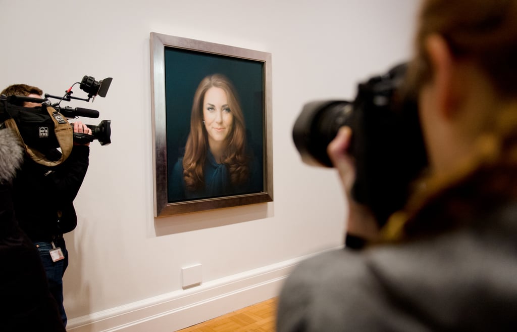 It was revealed that for her first portrait Kate wore a French Connection pussycat-bow blouse costing $84.