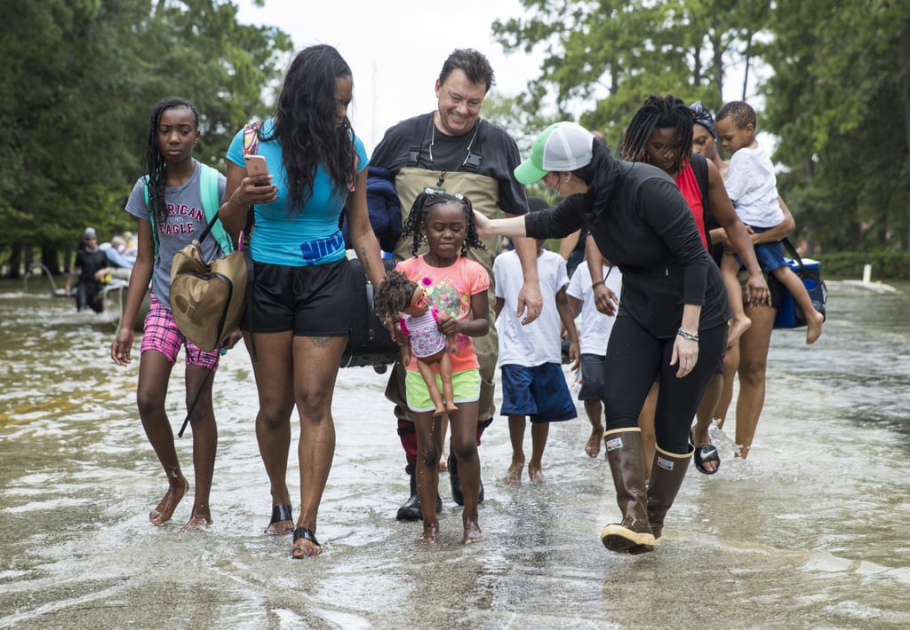 The Walker and Brown families leave their homes near west Houston, TX.