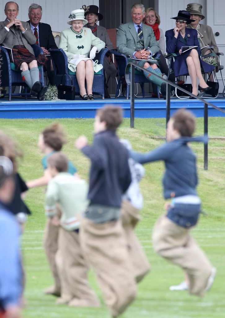 The royal family watched the sack race from the royal box during the Braemar Highland Games on Sept. 4, 2010.