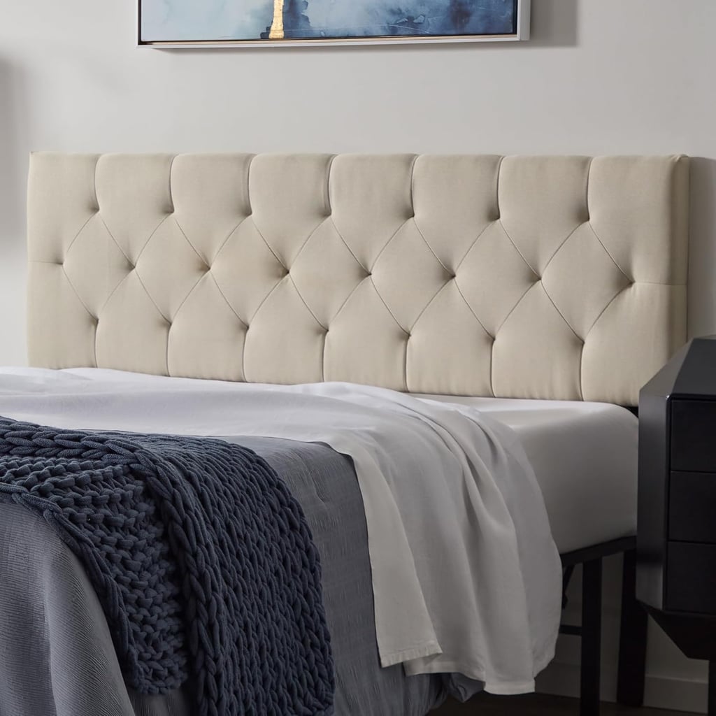 Lucid Mid-Rise Upholstered Headboard ($72)
This is one of those rare finds that looks far more expensive than it actually is. With classic tufting, adjustable height, and a no-stress setup, it's an easy win for upgrading a bedroom on a budget.
What we love:
Chic diamond-tufting detail.
A low-risk buy if you want to refresh a bedroom without a big investment.
Available on Amazon with fast shipping, so it works well for last-minute refreshes.
Adjustable height makes it easy to pair with different mattress and frame setups.
Who it's best for:
Anyone shopping for an affordable, no-frills headboard that looks elevated and works with a variety of bed frames.
Who should avoid it:
If you're looking for premium materials or a fully custom, high-end look, this budget-friendly option may feel too simple.
The Details: Material: Polyester upholstery with foam padding | Sizes: Twin/Twin XL, Full/Full XL, Queen, King, King/Cal King | Color Options: 6