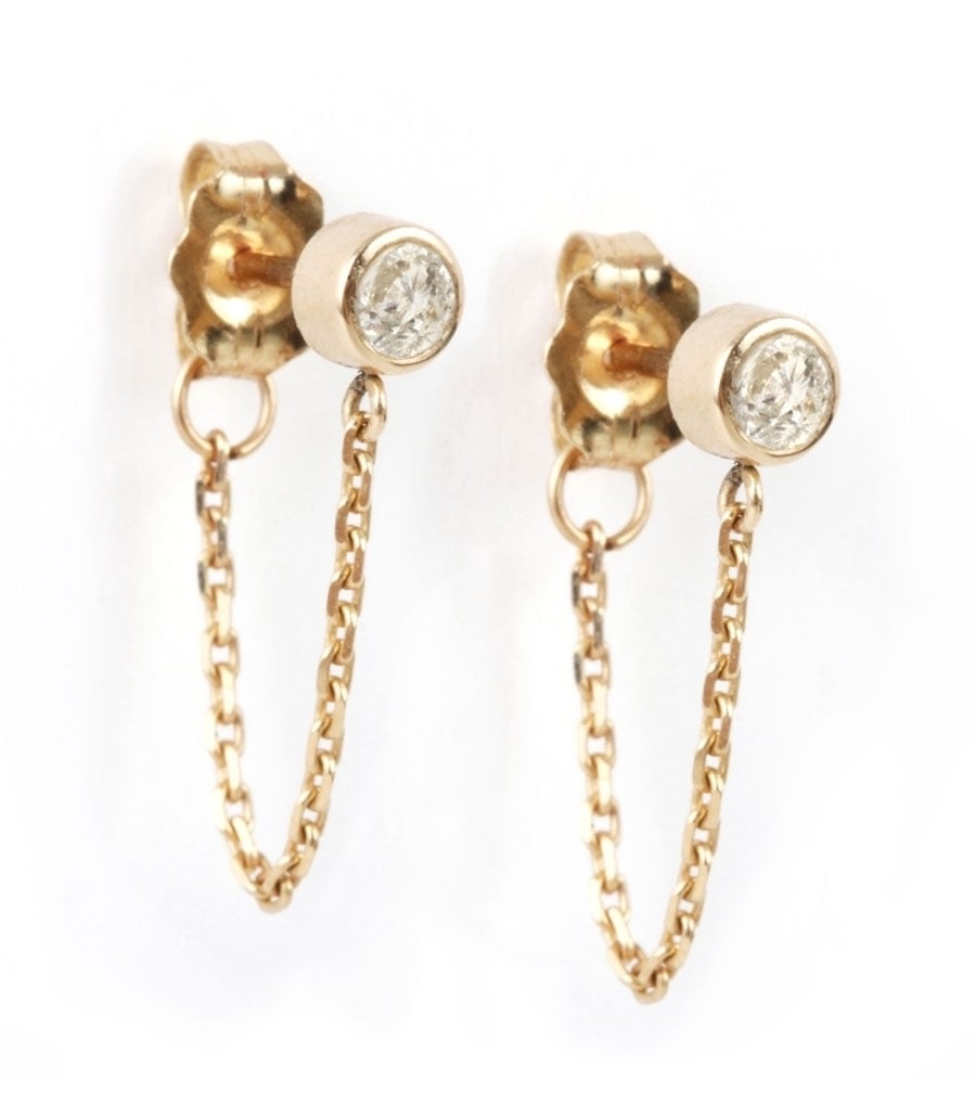 I'm all about jewelry that I can wear every day, so I've been on the hunt for a cool new pair of earrings that can survive my upcoming trips to the beach while still looking chic at my next barbecue. These Catbird chain earrings ($210) totally fit the bill.
— Aemilia Madden, assistant editor