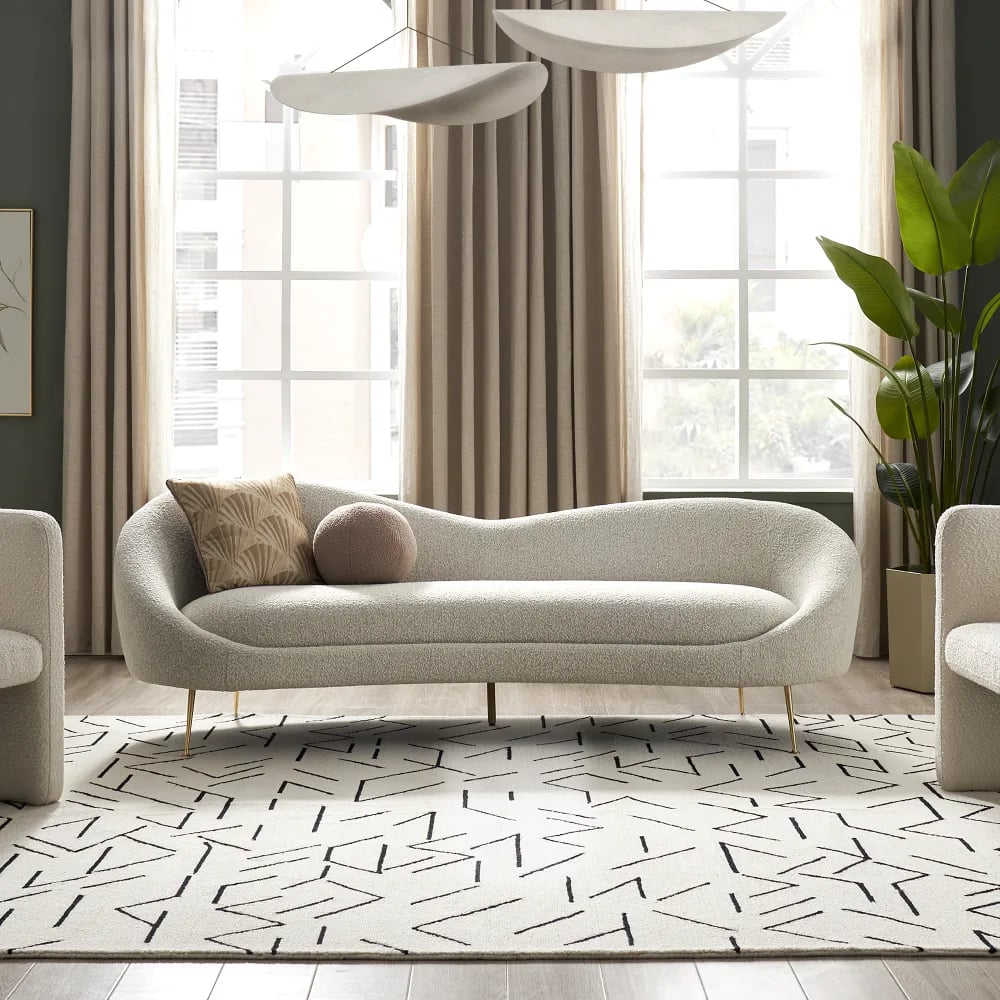 A Curved Sofa: Castlery Odette Performance Bouclé Sofa