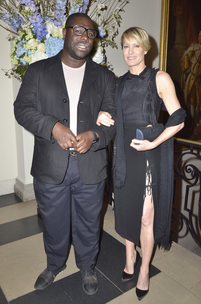Robin Wright held Steve McQueen's arm at the Capitol File event on Friday.