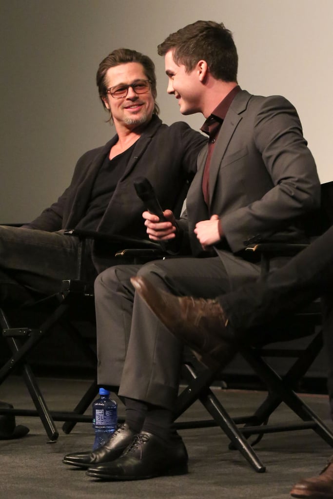 Brad Pitt shared a cute moment with Fury costar Logan Lerman at a screening in LA on Thursday.