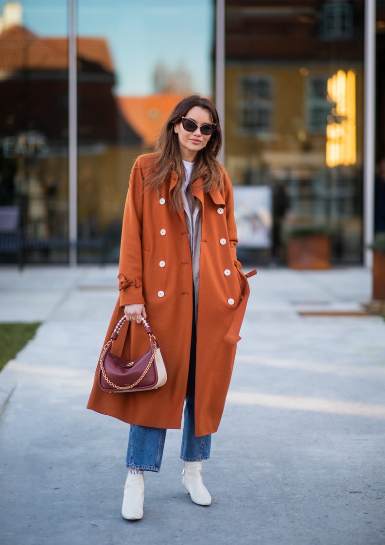 With a Long Coat and White Boots