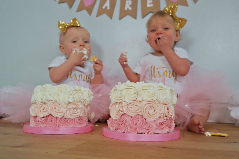 Lily and Lyla with their cakes.