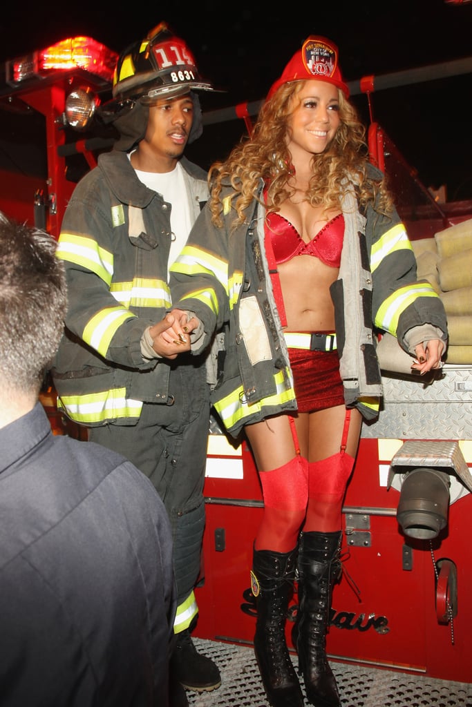 名人万圣节服装:玛丽亚·凯莉和尼克大炮,消防队员