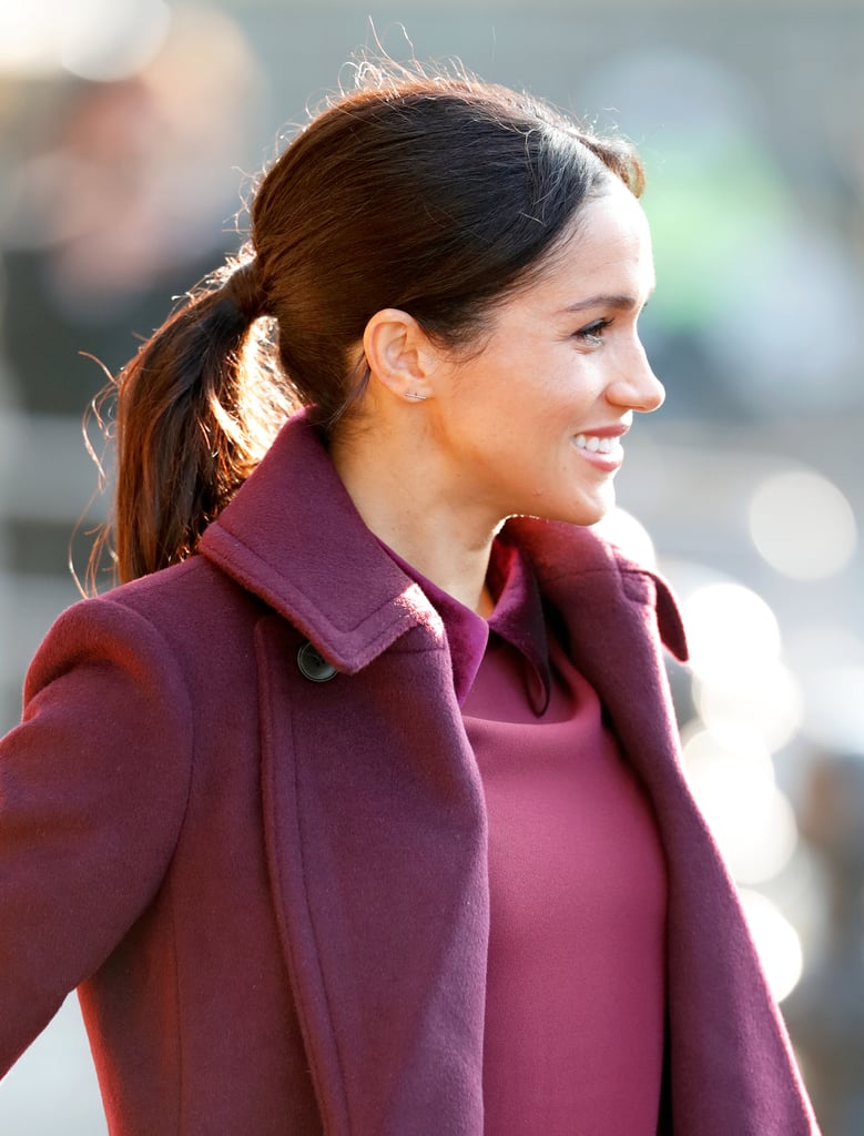 Meghan Markle's messy ponytail is especially date-night worthy.