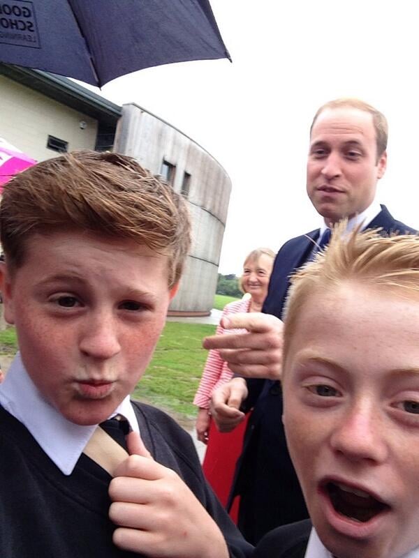 A schoolboy in East Riding of Yorkshire, England, snapped what he called a "cheeky" photo of Prince William when the royal visited his school in June 2014.
Source: Twitter user RaspinJack