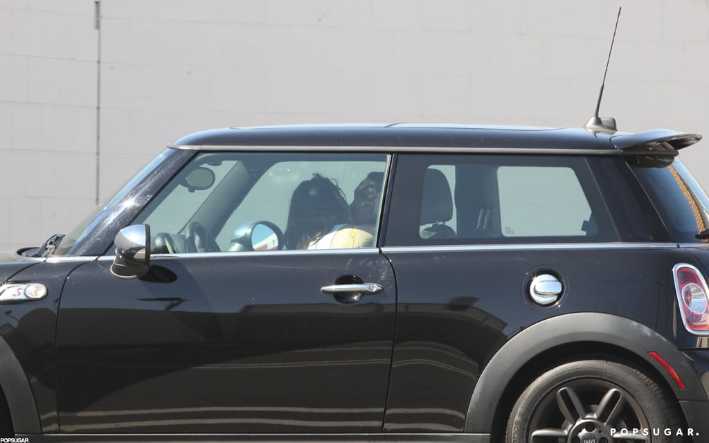 Kristen Stewart and Rupert Sanders pulled over in her Mini Cooper.