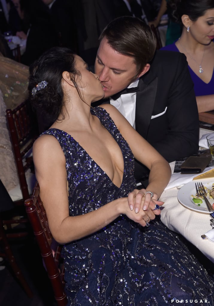 Channing Tatum and Jenna Dewan Tatum shared a sweet kiss in their seats.