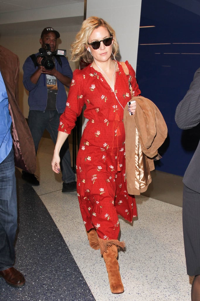 Kate Hudson couldn't help but give her printed maxi dress a boho twist by adding some fringe boots.