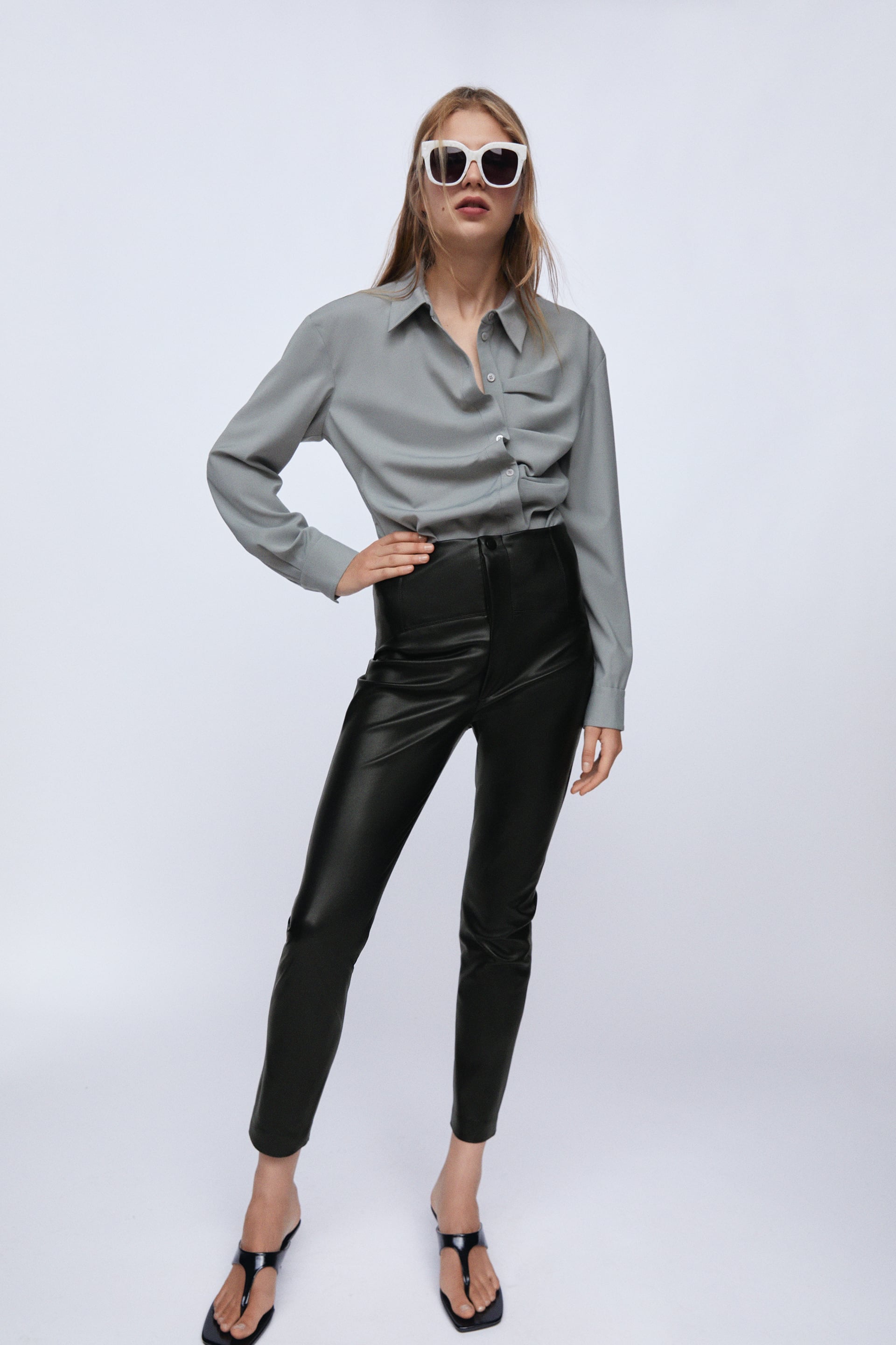 Meghan Markle in a Victoria Beckham Blouse and Leather Pants