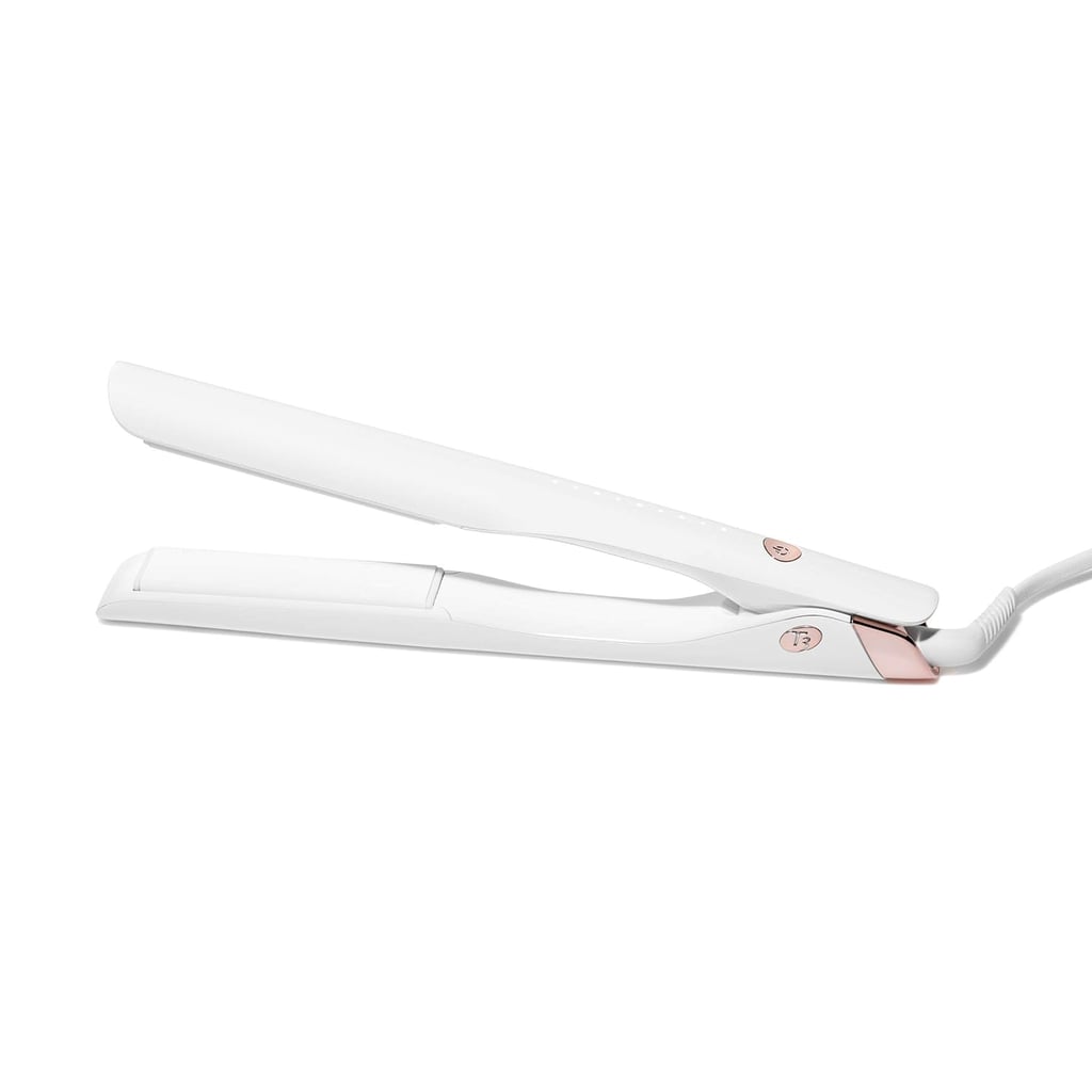 T3 Lucea Professional Straightening & Styling Iron ($140, originally $190)
T3 products rarely go on sale, so I'm eyeing this styling iron while it's on discount for a limited time. It is silk press season, and I'd love to see how my hair would react to it, since customers say it gets their hair straight and shiny with just one pass. It also has nine different heat settings, which makes me feel more comfortable about trying it on my heat-virgin hair.