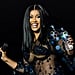Cardi B Shows Off Her Butt Tattoos in a Plunging Lace-Up Catsuit