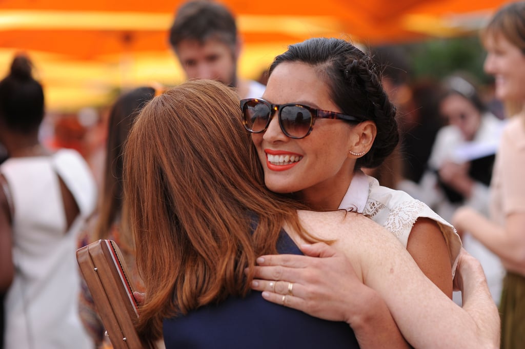 Olivia lit up with a smile as she hugged Julianne.