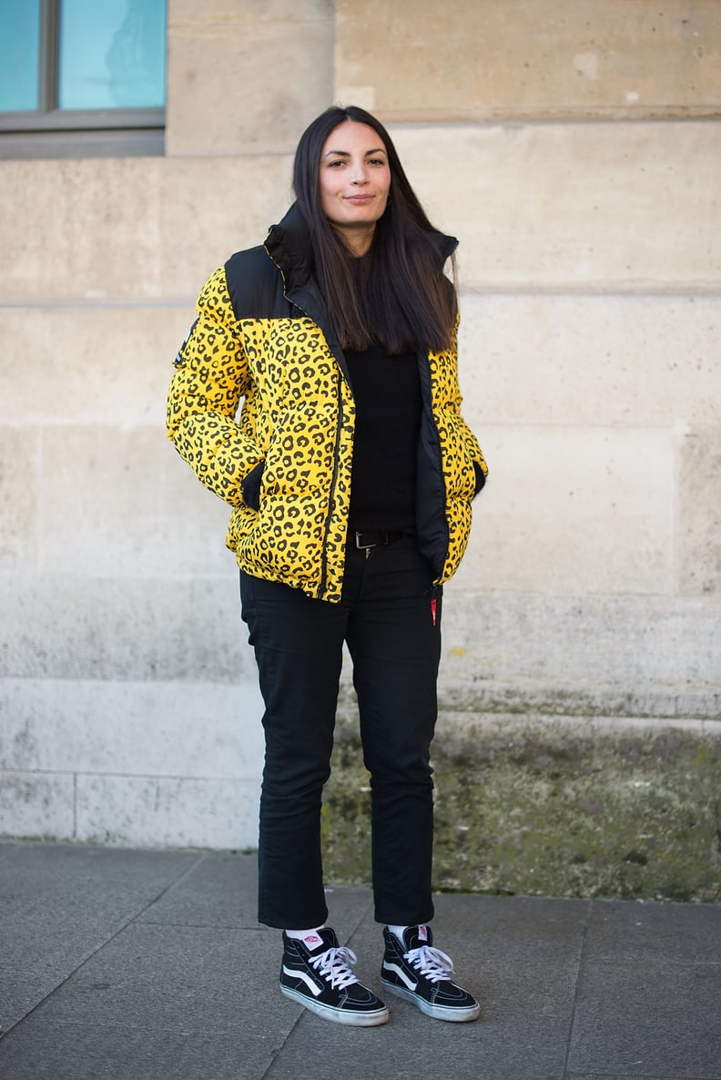 With a Patterned Puffer Jacket and Straight-Leg Jeans