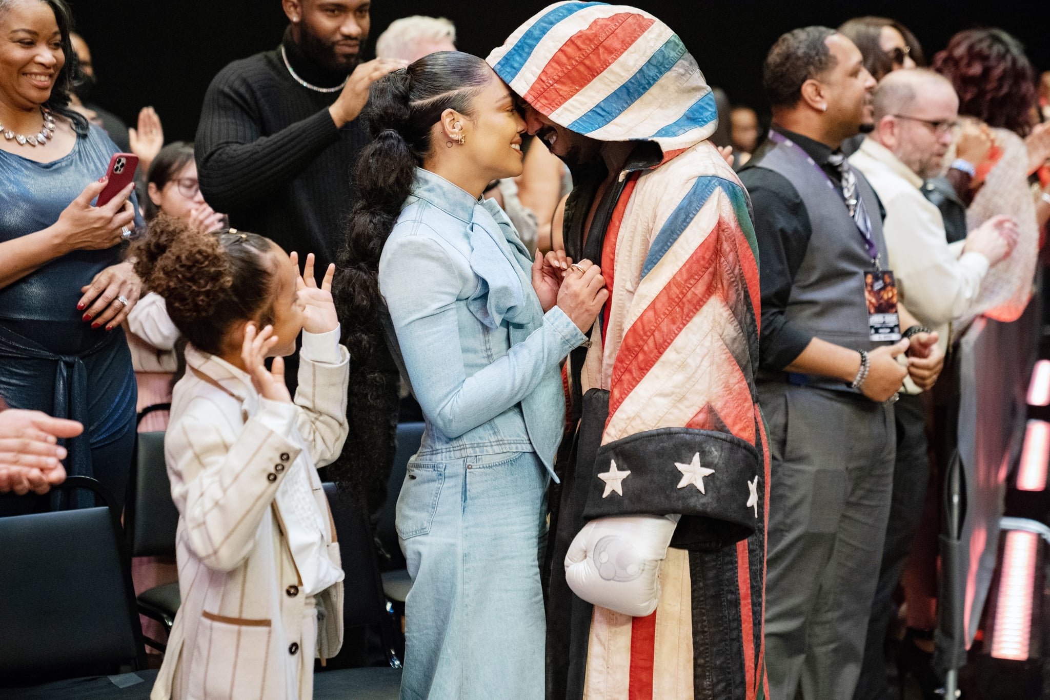 CREED III, from left: Mila Davis-Kent, Tessa Thompson, Michael B. Jordan, 2023. ph: Eli Ade / MGM /Courtesy Everett Collection