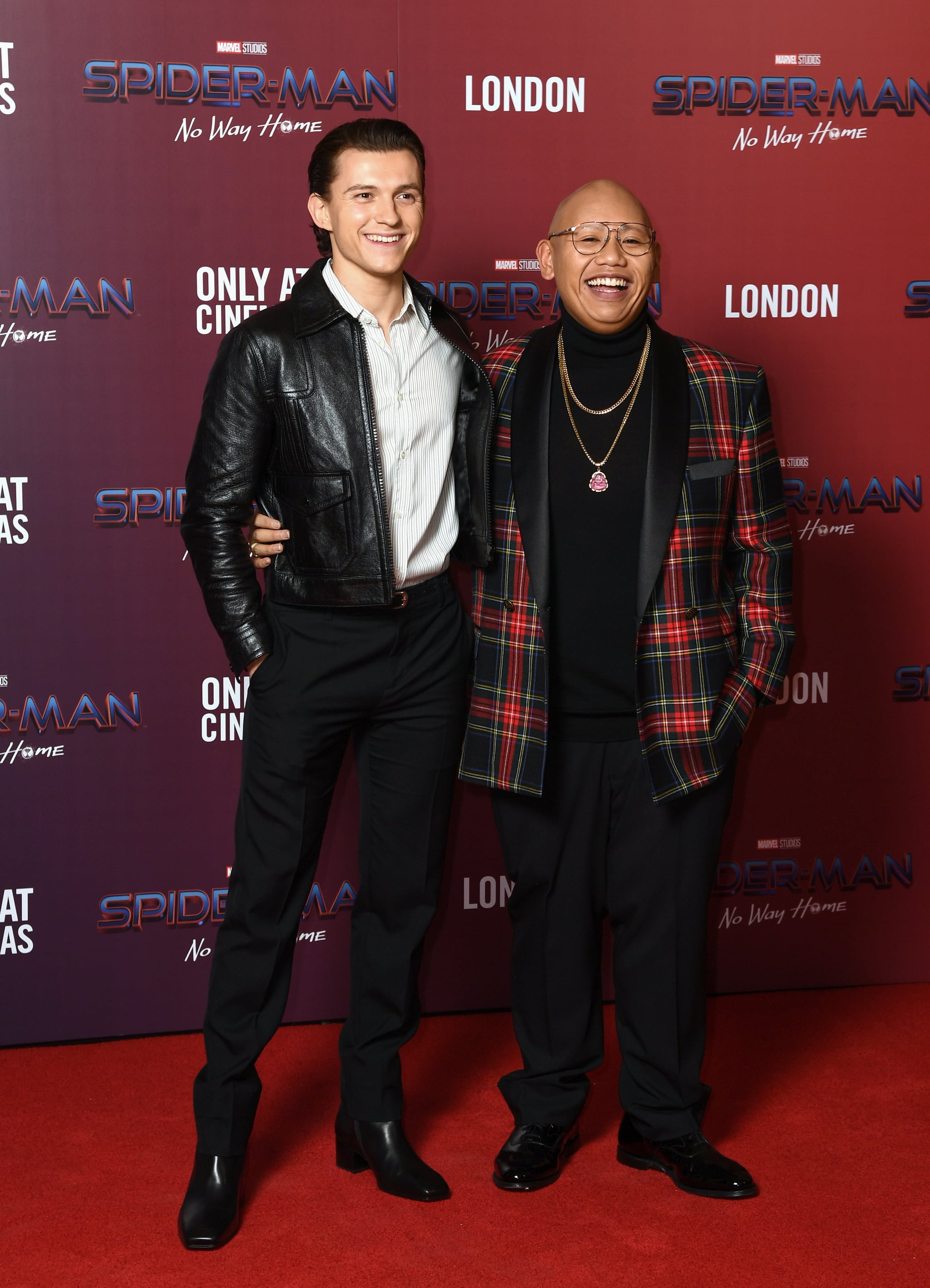 LONDON, ENGLAND - DECEMBER 05: (L-R) Tom Holland and Jacob Batalon attend a photocall for 