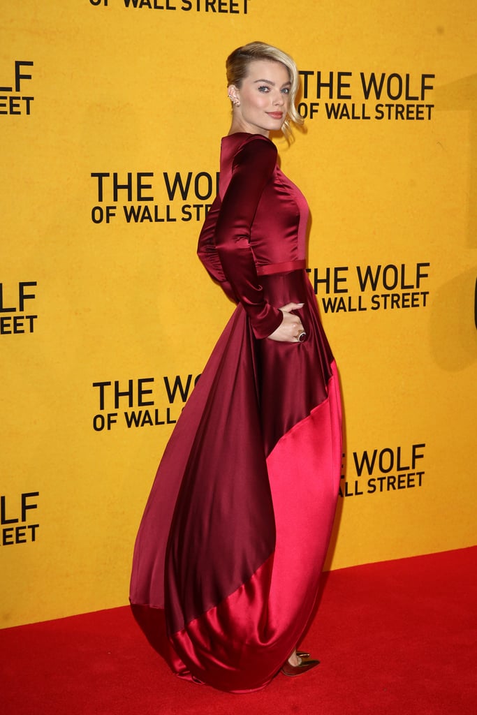 Margot Robbie's Oscar de la Renta gown took inspiration from the sexy tone of The Wolf of Wall Street, while its twirling train and scarlet hue made us think of another cinematic classic.