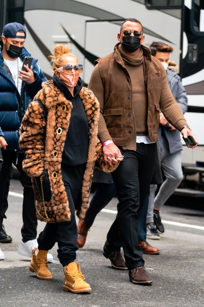 Styling her black Frankies Bikinis sweatsuit with Timberlands and a fuzzy Coach coat.