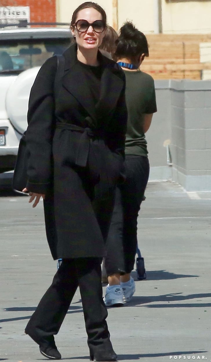 Angelina Jolie Wearing Black Trousers