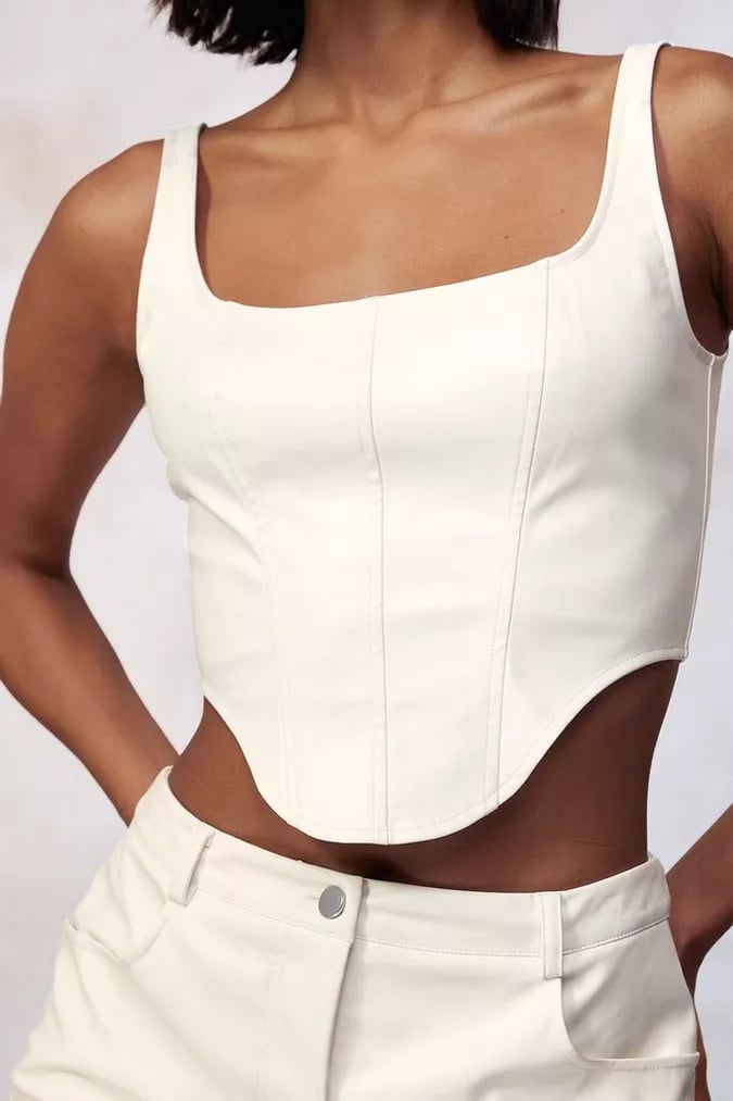 A Corset Top: Boohoo by Kourtney Kardashian Barker Faux Leather Corset Top