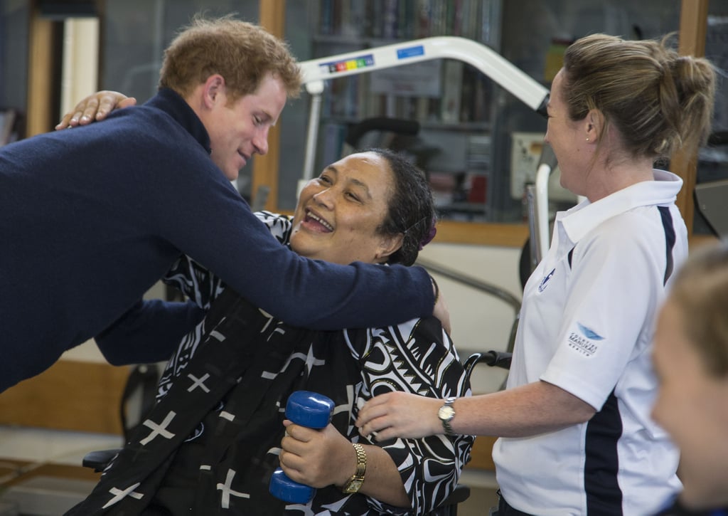 Harry got a hug from a patient while visiting a spinal rehabilitation unit in Auckland in 2015.