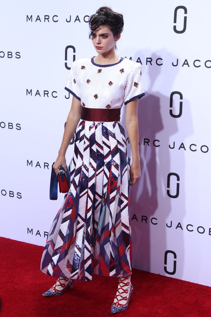 Kendall Jenner walked the playful runway-cum-red carpet at Marc Jacobs in a boldly patterned sequin maxi.