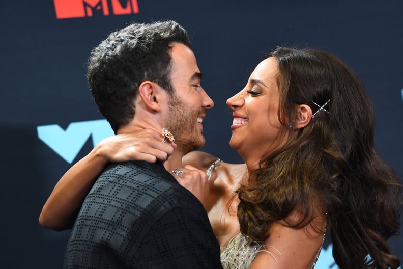 US musician Kevin Jonas (L) and wife Danielle Jonas pose in the press room during the 2019 MTV Video Music Awards at the Prudential Center in Newark, New Jersey on August 26, 2019. (Photo by Johannes EISELE / AFP)        (Photo credit should read JOHANNES