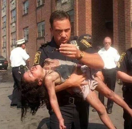Police Officer Reunites With Girl He Saves at Her Graduation