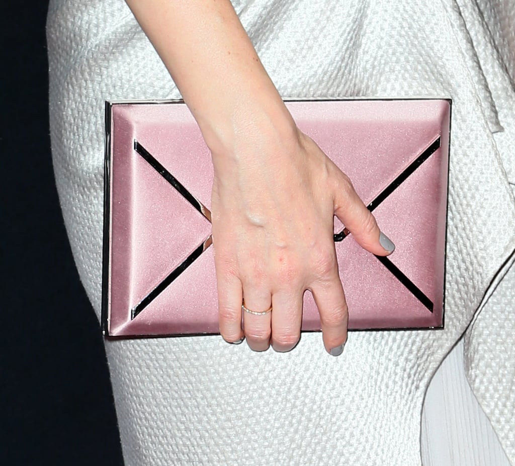 Kate Mara played a soft, metallic envelope clutch against her silver gown.