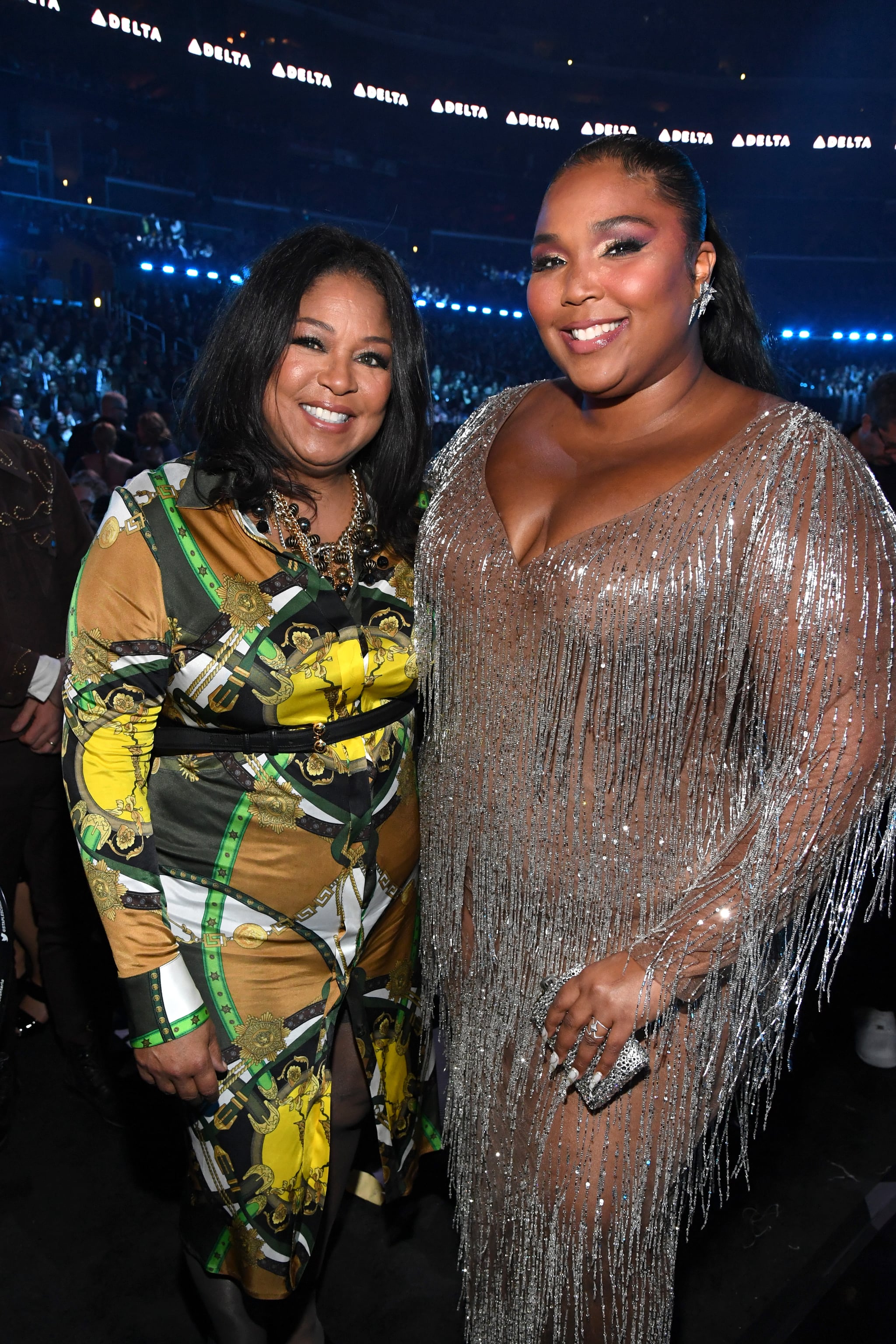 LOS ANGELES, CALIFORNIA - JANUARY 26: LIzzo (R) and Shari Johnson-Jefferson during the 62nd Annual GRAMMY Awards at STAPLES Centre on January 26, 2020 in Los Angeles, California. (Photo by Kevin Mazur/Getty Images for The Recording Academy)