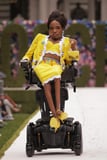 Model Aaron Rose Philip Just Made Her Runway Debut For Moschino: “Disabled Talents Matter”