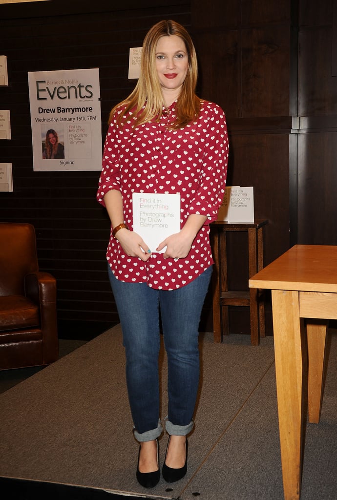 Drew Barrymore signed copies of her new book, Find It in Everything, working a heart-print Topshop blouse with cuffed denim.
Where to Wear: A sleepover with your gals. Prank-calling: optional.