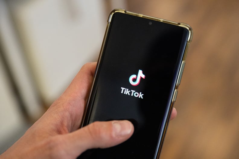 This photograph taken on April 19, 2024 shows a man holding a smartphone displaying the logo of social media platform Tiktok in an office in Paris (Photo by Antonin UTZ / AFP) (Photo by ANTONIN UTZ/AFP via Getty Images)