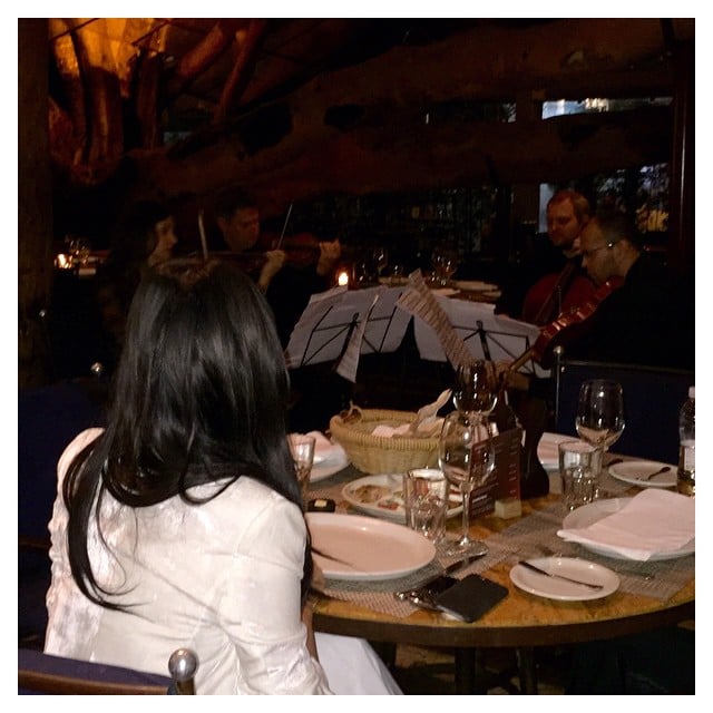 Kanye surprised Kim with an extravagant dinner. "So I get to a restaurant in São Paulo & my husband had a string quartet waiting playing Sam Smith!!!!!" she captioned this picture of the scene. "Every single waiter who brought food said 'This is from Mr. West for the best mother in the world'! Seriously I have the best husband ever!!!!"