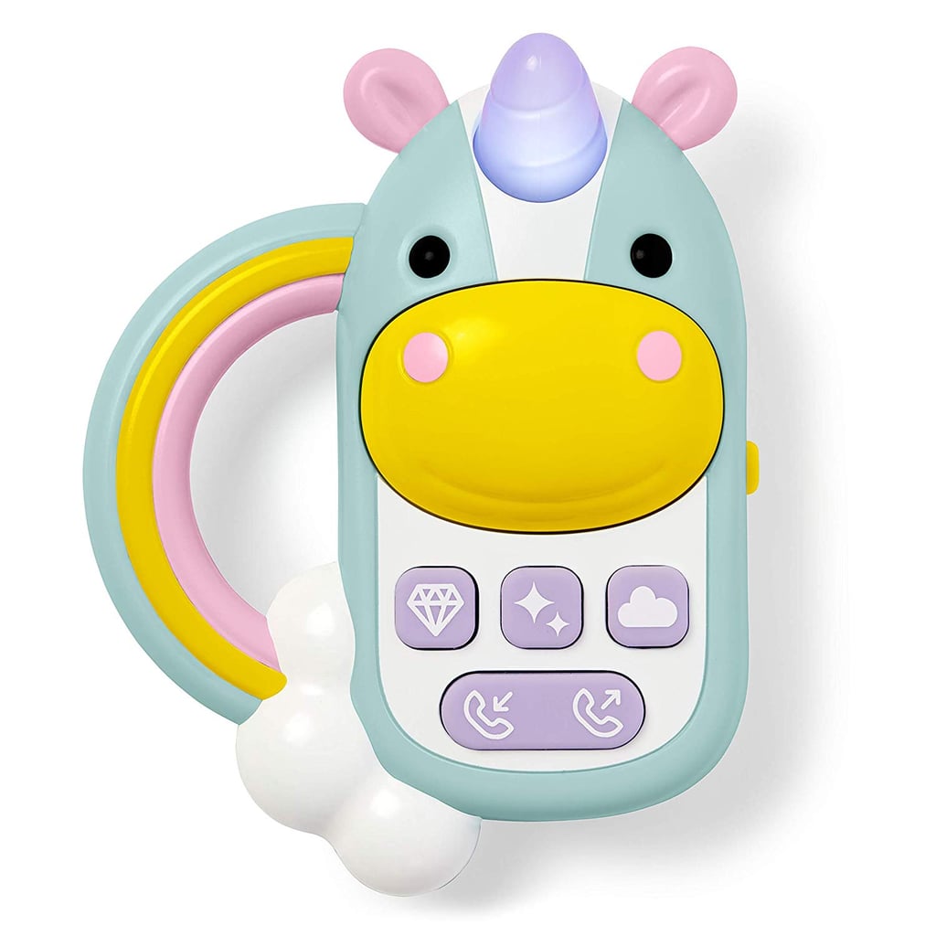 婴儿的沉迷于手机:跳过跳婴儿玩具手机,动物园的独角兽