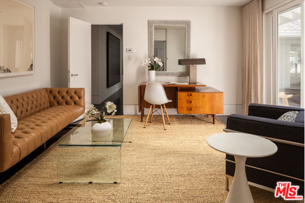This spacious third bedroom is currently being used as an office, but it could easily be converted back to create more sleeping area for buyers with kids.