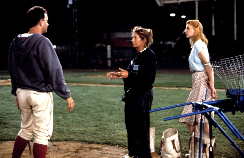 A LEAGUE OF THEIR OWN, Tom Hanks, Penny Marshall, Geena Davis on set, 1992, (c)Columbia Pictures/courtesy Everett Collection