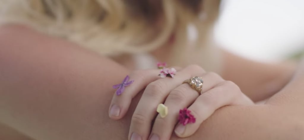 Miley Flashes Her Gorgeous Antique-Style Engagement Ring Numerous Times Throughout the Video