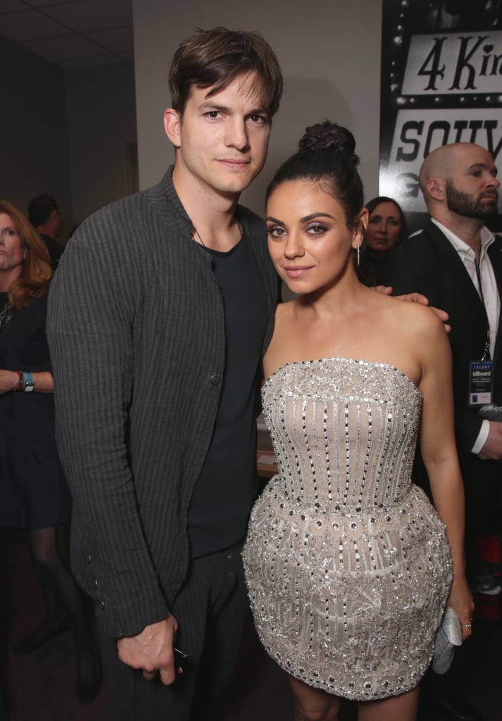 Mila Kunis and Ashton Kutcher took a break from their parental duties and popped up at the Billboard Music Awards in Las Vegas on Sunday evening. Mila, who's been busy promoting her latest film, Bad Moms, dressed to the nines in a gorgeous sparkly dress and struck a handful of stunning poses alongside her costars Kathryn Hahn and Kristen Bell on the pink carpet. While Ashton did not join Mila outside, he did link up with her inside, where he also met up with Mark Cuban, Kate Beckinsale, among other stars. Similarly, the actress posed for a series of fun pictures alongside Lucy Hale and Jessica Alba. Take a look at all the stunning arrivals from the night.