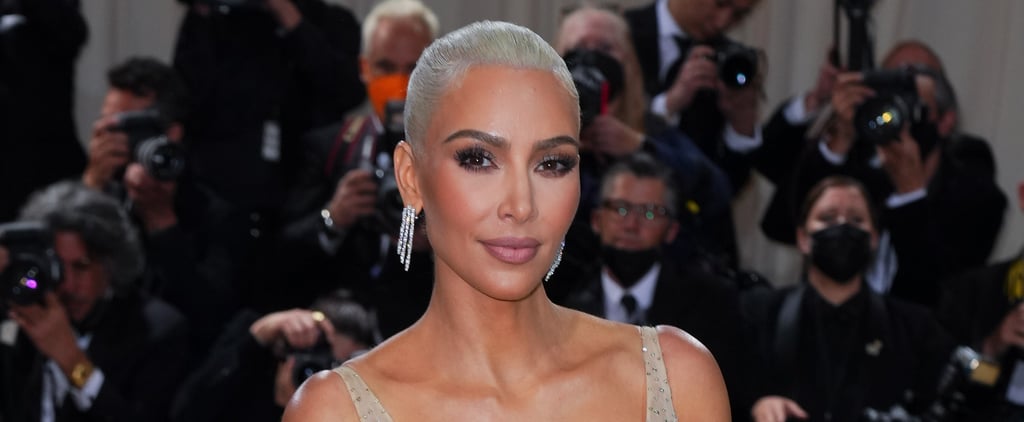 Kim Kardashian Struggles to Walk and Climb Stairs in Skintight Chain-Mail Gown