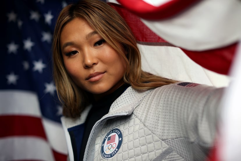 Chloe Kim poses with American flag before Olympics